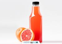 دانلود موکاپ آبمیوه پرتقال بطری پلاستیکی نارنجی رنگ