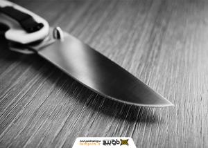 تصویر استوک چاقوی آهنی با دسته نقره ای و مشکی