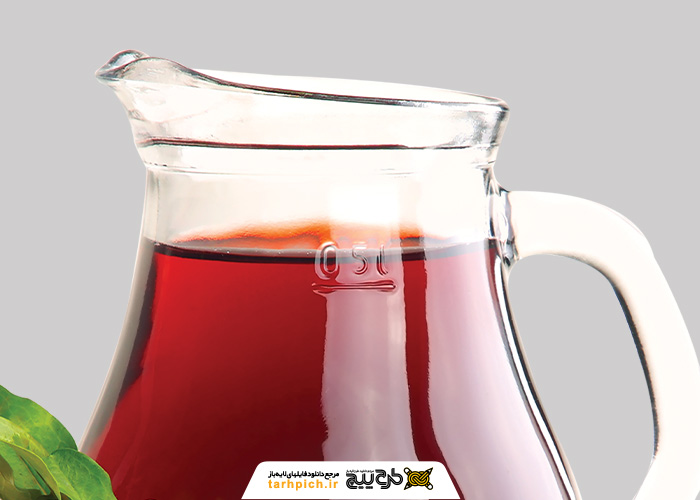 دانلود عکس آب انار در پارچ دور بری شده