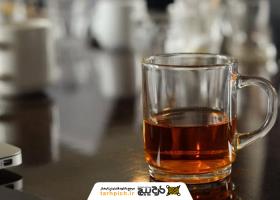دانلود تصویر استوک چای در لیوان فرانسوی دسته‌دار