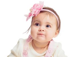 دانلود تصویر نوزاد دوربری شده با گل سر