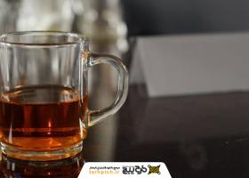 دانلود تصویر استوک چای در لیوان فرانسوی دسته‌دار